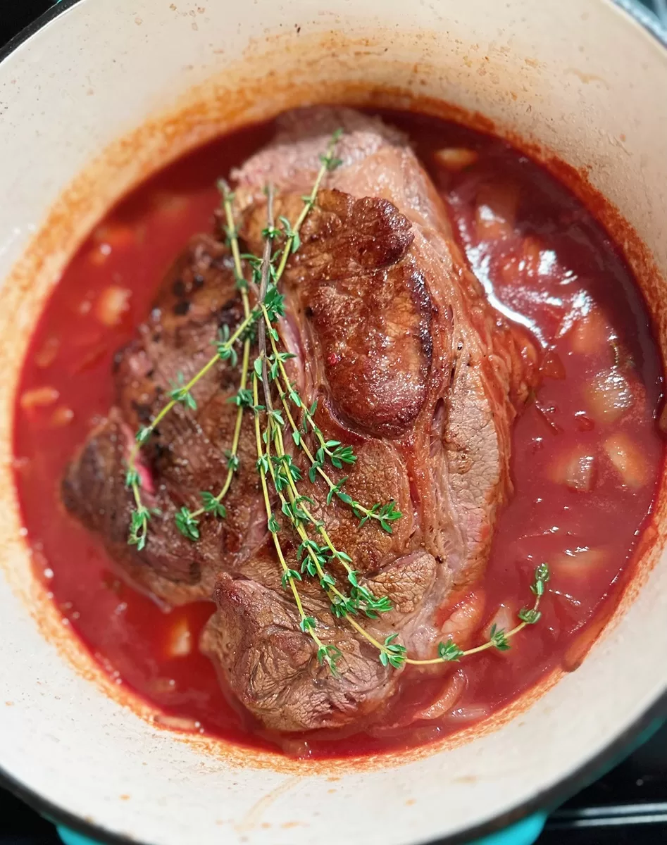 chuck roast inside of pot roast stew simmering