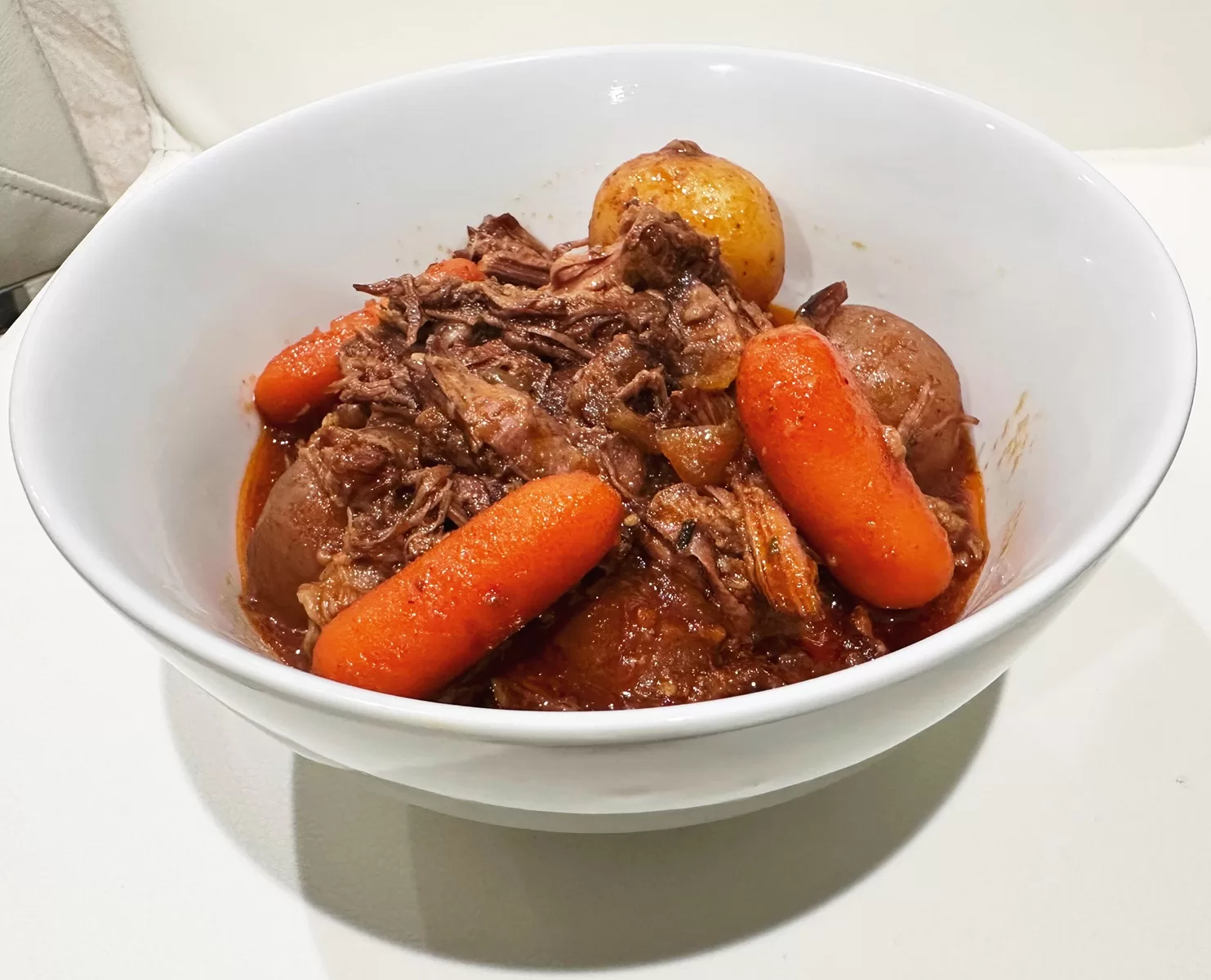 pot roast in white bowl