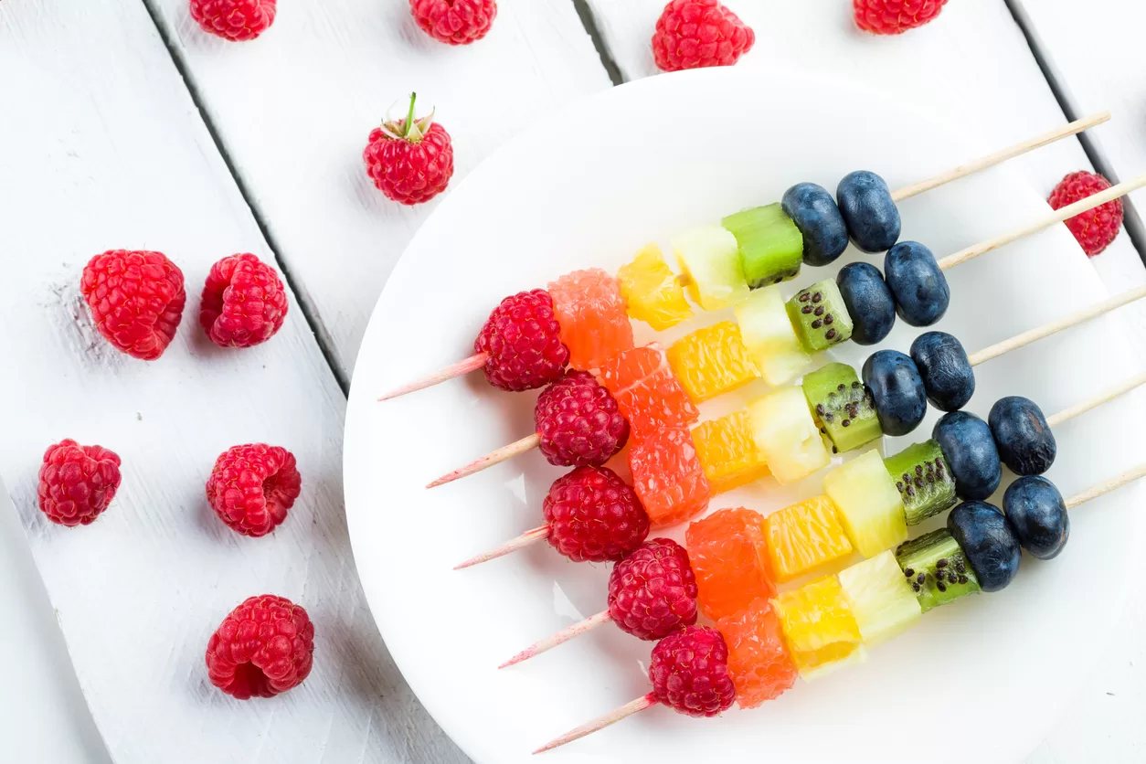 Fresh summer fruits on sticks.