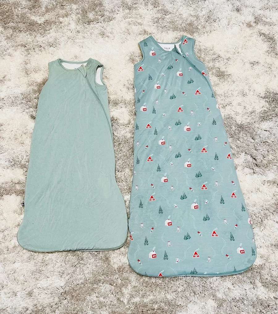 comparison of size small sleep sack next to size large