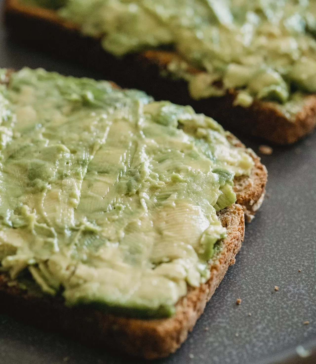 avocado smeared on whole grain toast