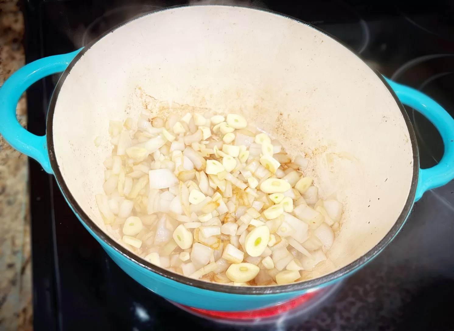 onions cooking in dutch oven