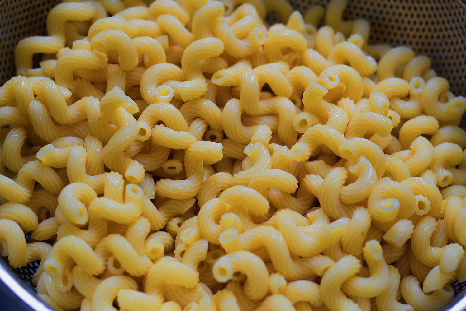 cavatappi pasta in a colander